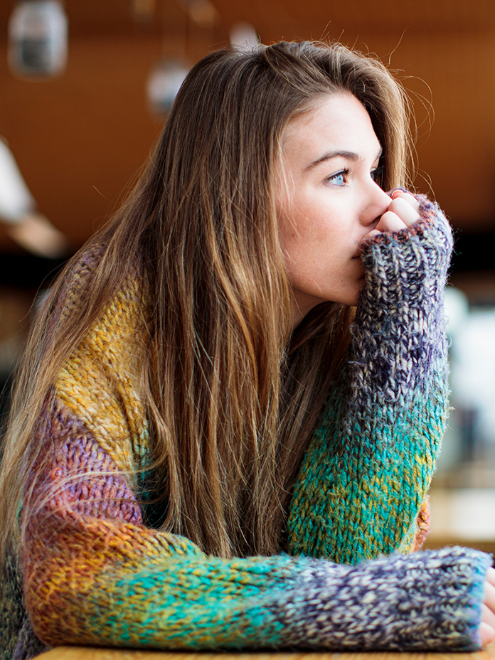 Lady with sweater looking to the side